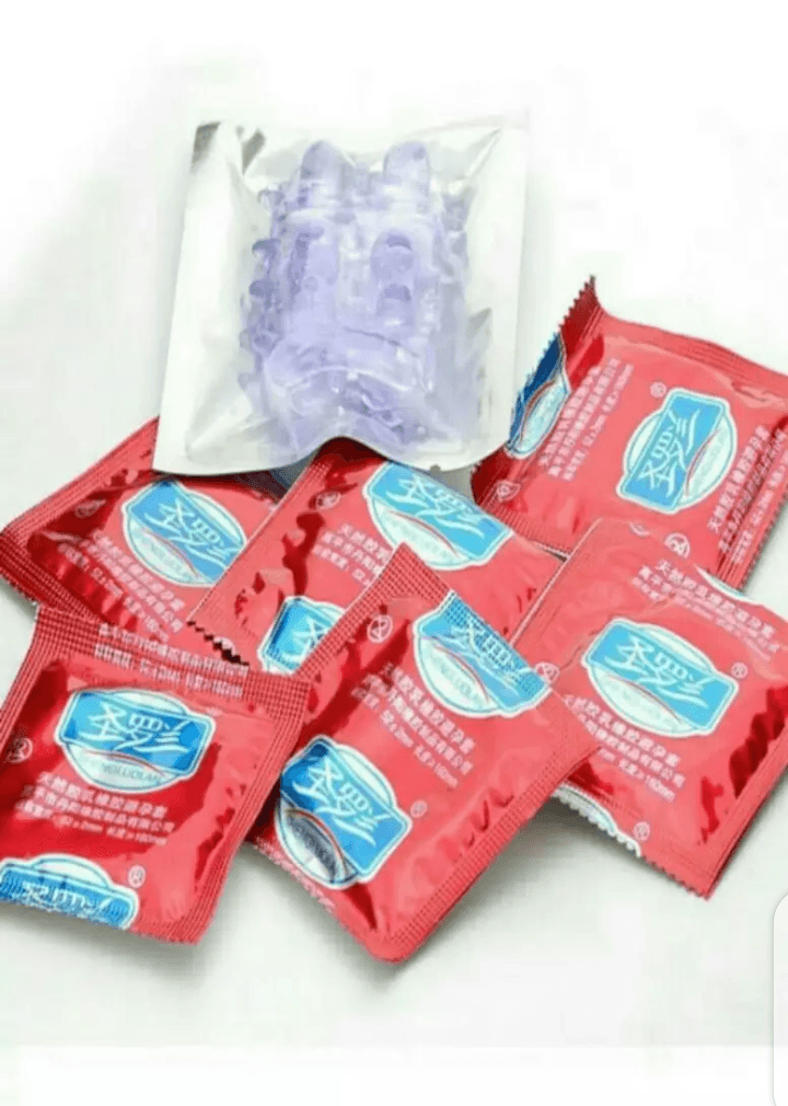 12 Pieces Of Special Dotted Delaying Condoms With A Silicon Sleeve